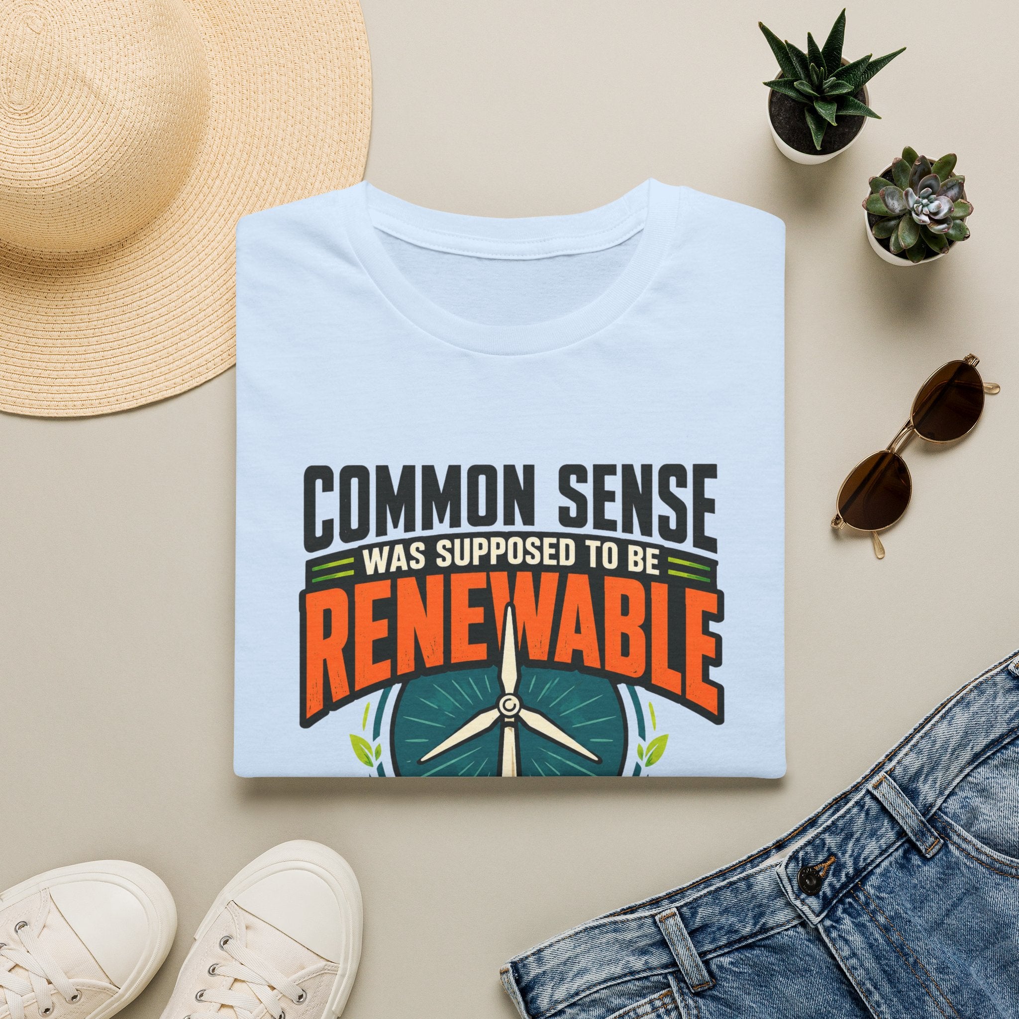 Renewable Energy T-Shirt — "Common Sense Was Supposed to Be Renewable" Eco Graphic Tee