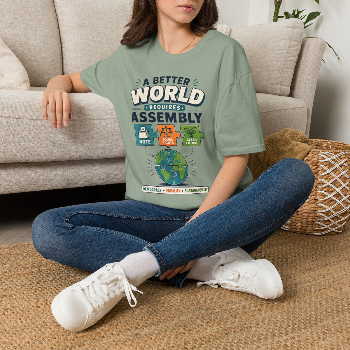 A Better World Requires Assembly T-Shirt — Sustainability, Voting & Community Graphic Tee
