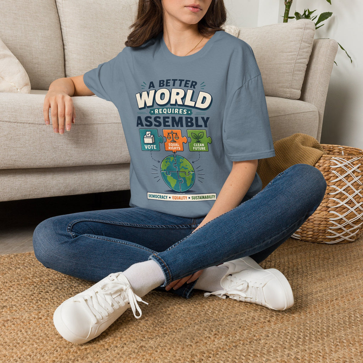 A Better World Requires Assembly T-Shirt — Sustainability, Voting & Community Graphic Tee