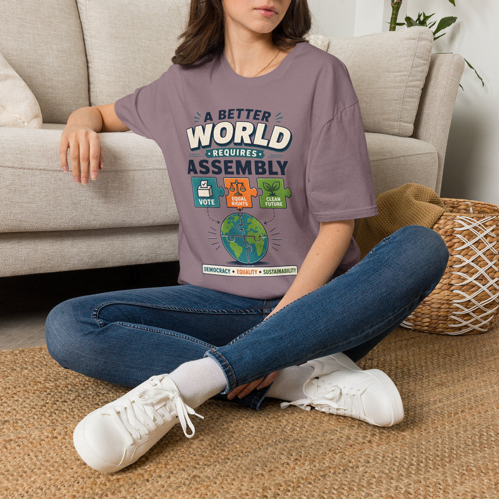 A Better World Requires Assembly T-Shirt — Sustainability, Voting & Community Graphic Tee