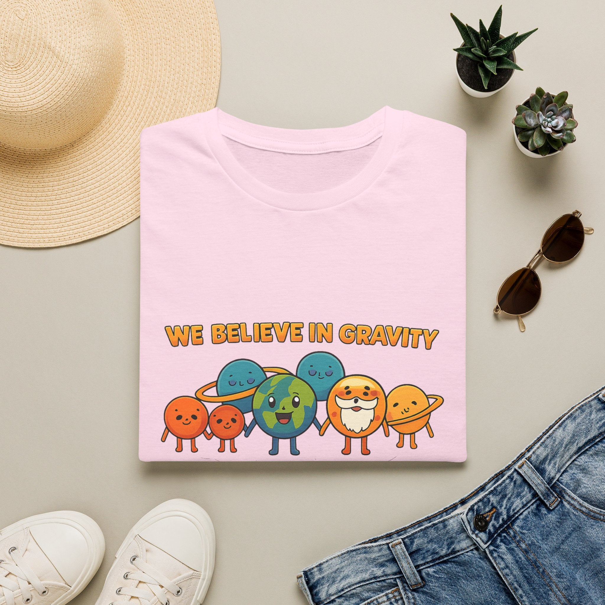 Cute Planetary Cartoon "We Believe in Gravity" Tee