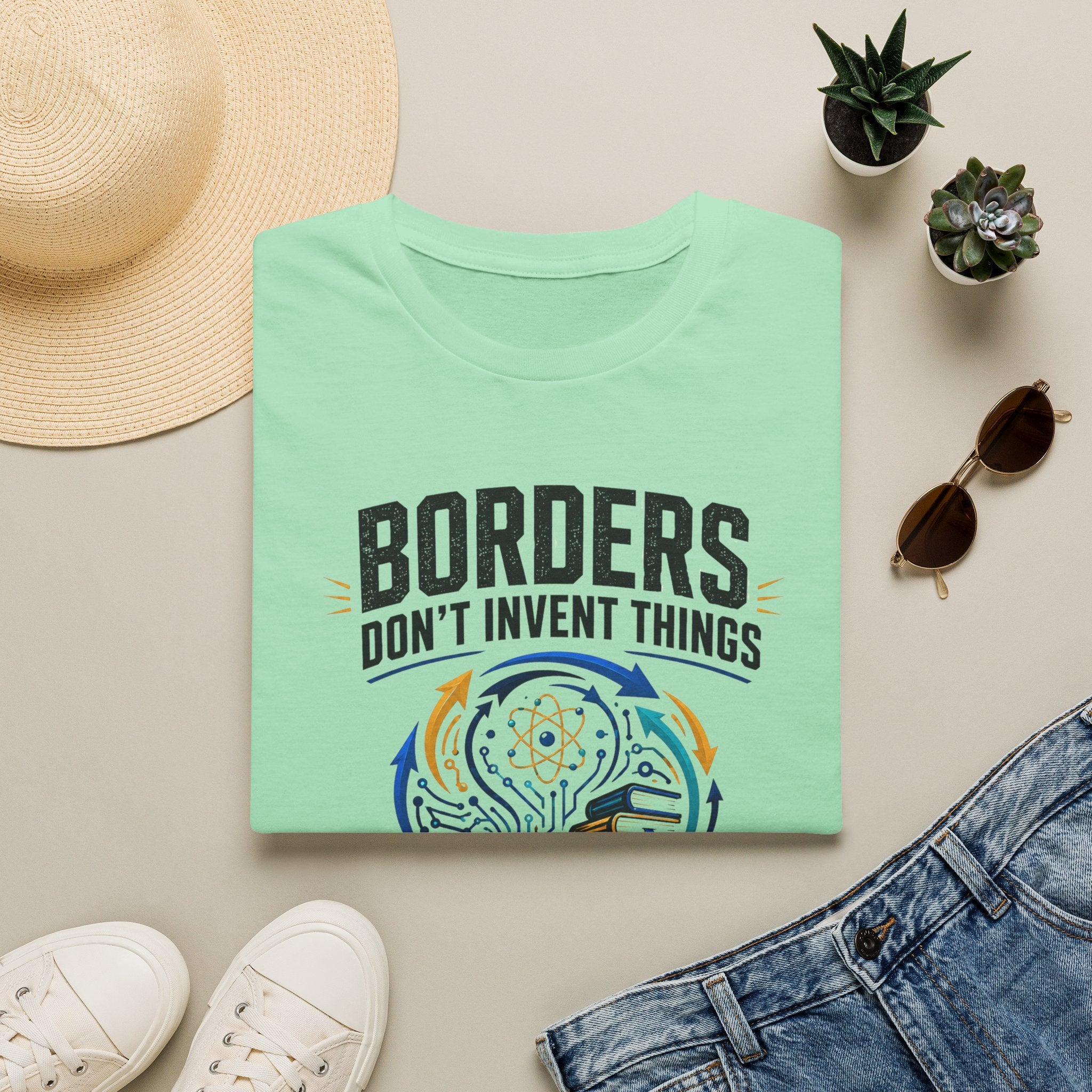 T-Shirt — “Borders Don't Invent Things, People Do” Graphic Tee (Unity · Creativity · Humanitarian)
