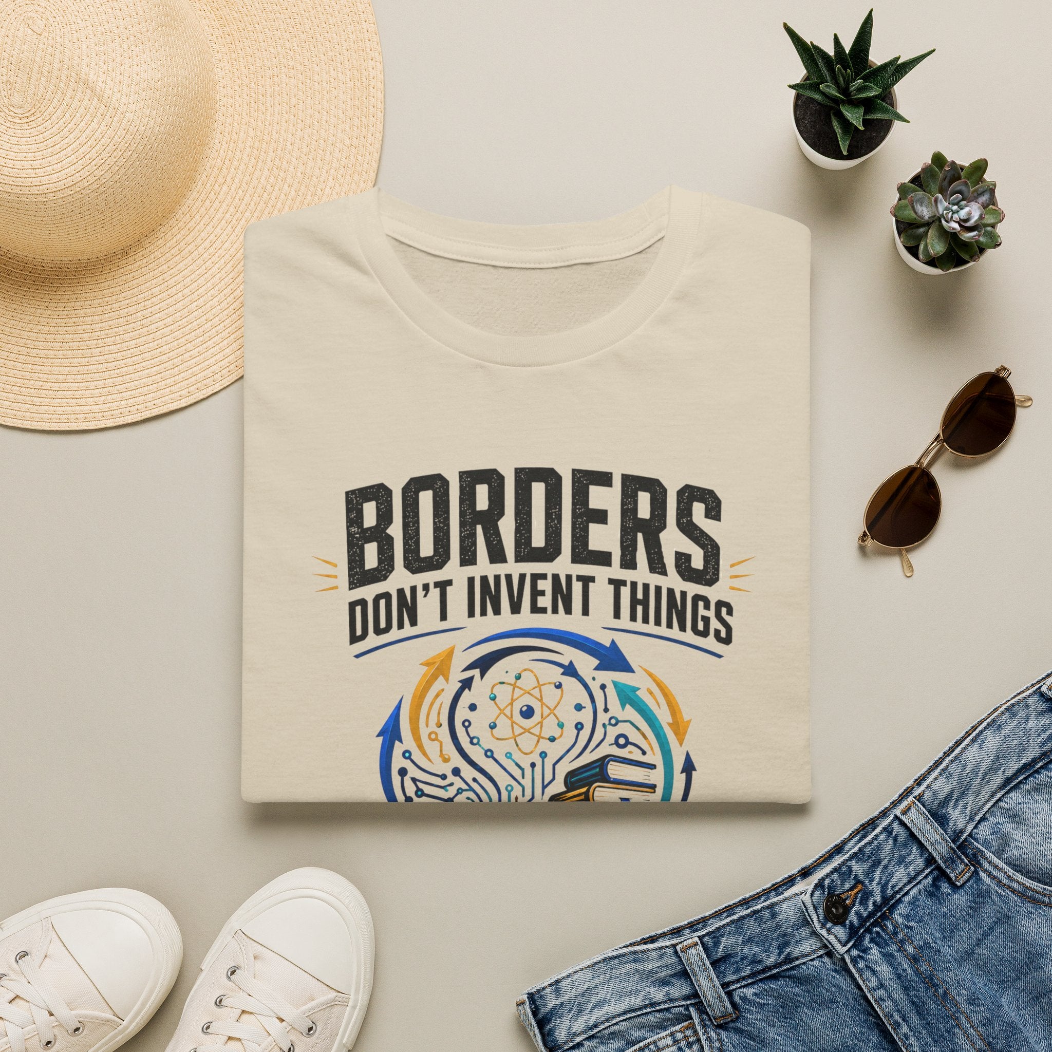 T-Shirt — “Borders Don't Invent Things, People Do” Graphic Tee (Unity · Creativity · Humanitarian)